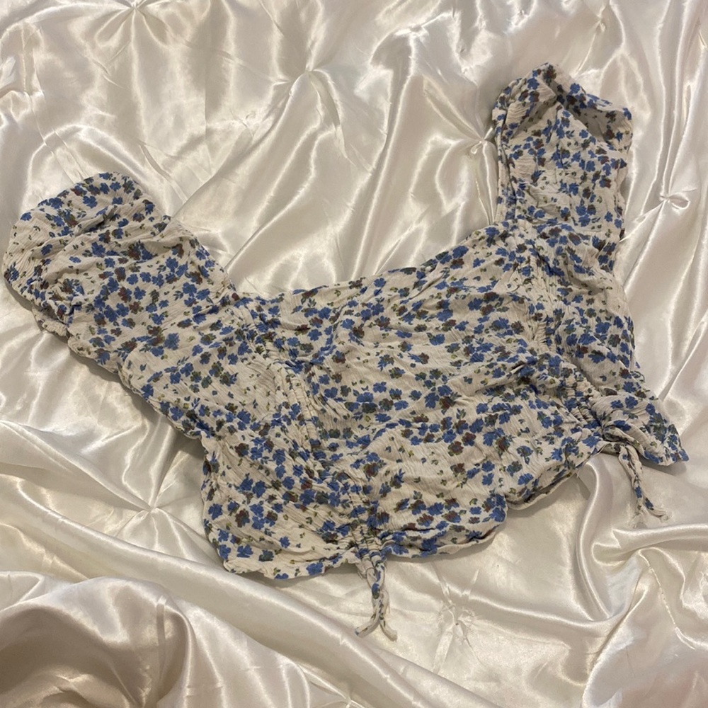 White top with blue flowers in good condition, only been used a couple times